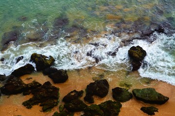 the waves of the sea among the stones on the shore