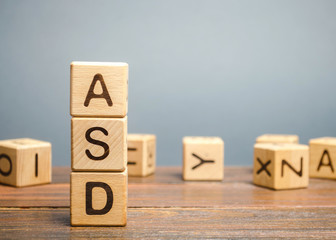 Wooden blocks with the word ASD - Autism Spectrum Disorder. Neurological and developmental disorder