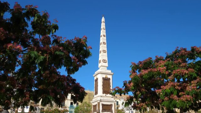 Obelisk dedicated to General Torrijos in Plaza de la Merced, popular square in the historic centre.