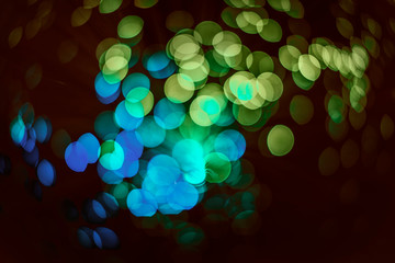 abstract background glitter lights green and blue