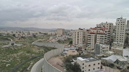 Aerial footage of the separation wall between Israel and the Palestinian Authority in Jerusalem