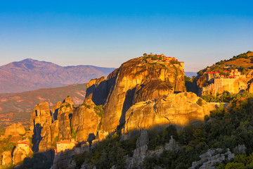 Landscape with monasteries and rock formations in Meteora, Greece. during the sunrise