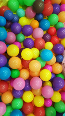 Fototapeta na wymiar Plastic toy balls of different colors