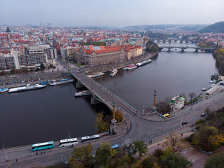 Fototapeta premium Prague bridges aerial view at autumn in twilight cloudy day, blue hour