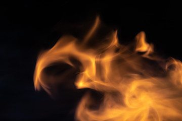 Soft blur flame with soft detail moving from right to the left on black background. For overlay effect
