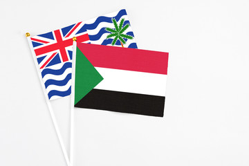Sudan and British Indian Ocean Territory stick flags on white background. High quality fabric,...
