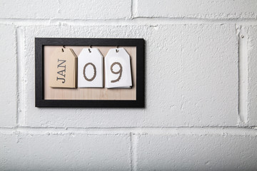 Wall Hanging Calendar in a Picture Frame Showing January 9