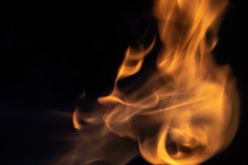 Fototapeta premium Soft blur flame with soft detail moving from bottom to the top on black background. For overlay effect