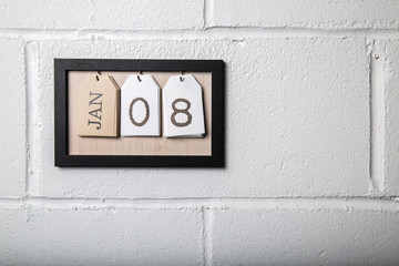 Wall Hanging Calendar in a Picture Frame Showing January 8