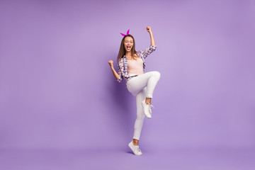 Full length photo of delighted crazy girl hear lottery win news raise fists scream yeah wear vintage outfit isolated over violet color background