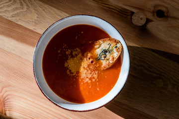 Tomato Soup with Parmesan Cheese Bread in Natural Light and Sunlight