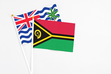 Vanuatu and British Indian Ocean Territory stick flags on white background. High quality fabric,...