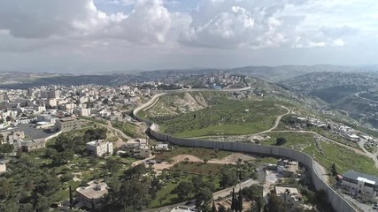 Aerial footage of the separation wall between Israel and the Palestinian Authority in Jerusalem