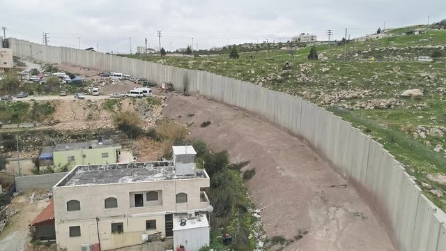 Aerial footage of the separation wall between Israel and the Palestinian Authority in Jerusalem