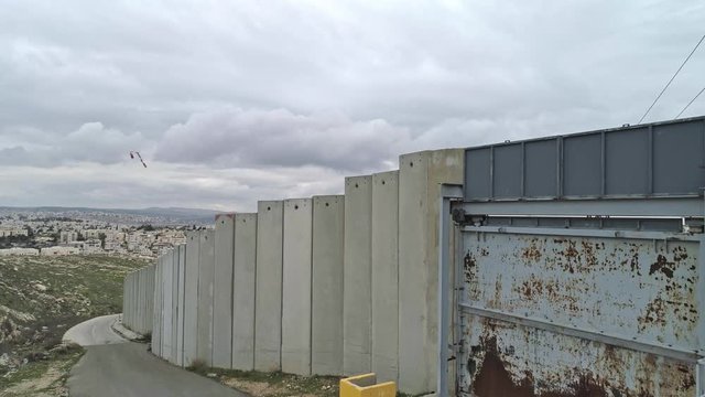 Aerial footage of the separation wall between Israel and the Palestinian Authority in Jerusalem