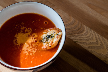 Tomato Soup with Parmesan Cheese Bread in Natural Light and Sunlight