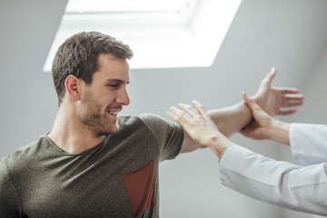 Patient Stretching His Arm