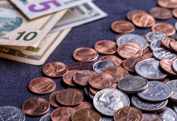 Pile of Golden coin, silver coin, copper coin, quarters, nickels, dimes, pennies, fifty cent piece and dollar coins. Various USA coins, American coins for business, money, financial coins and economy