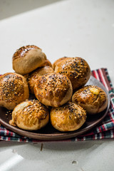 Homemade Turkish Pastries Pogaca with Black Cumin and Sesame Seeds.