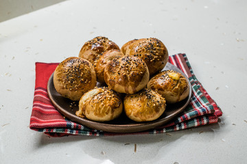 Homemade Turkish Pastries Pogaca with Black Cumin and Sesame Seeds.