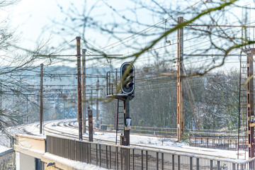 Urban railway train tracks under the snow in winter, near Paris France