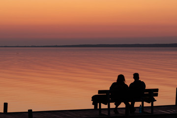 Fototapeta na wymiar Couple in sunset