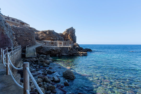 Cala Estellencs, is a stone and rock beach located in Estellencs, Mallorca, Spain. There is a cliff on the promenade of the cove and on the side there is a small jetty.