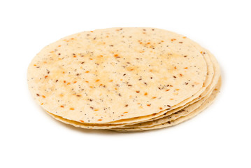 Pitta bread with seeds isolated on white