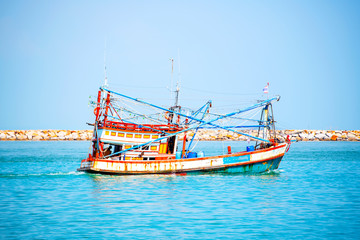 Local fishing boats fish in the sea morning sunrise,  Fishermen in Songkhla, Thailand