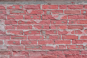 Background of collapsing brickwork, texture of the old cracked brick wall