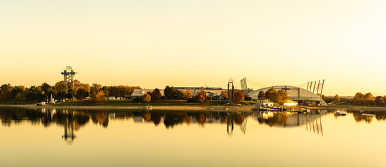 Premstaetten, Styria, Austria - November 12, 2019: panorama of lake schwarzl (schwarzlsee), event location of the lake festival near the styrian capitol graz in austria. Lake resort complex