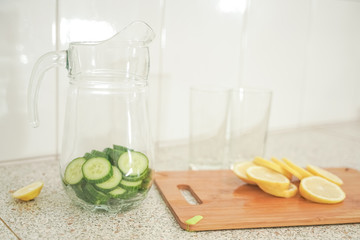 Fresh Lemonade with Cucumber and Lemon preparing with nobody