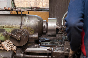 Metal processing by lathe machine. cutting tool at mechanical turning metal working