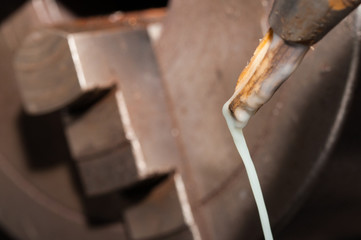 Metal processing by lathe machine. cutting tool at mechanical turning metal working