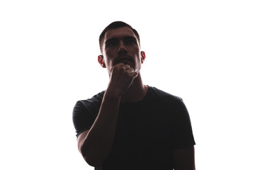 Silhouette of portrait of thinking man in full face looking up, isolated on white background