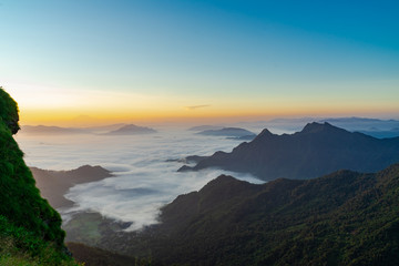 Obraz na płótnie Canvas Sunrise and Mist mountain in Phu Chi Fa located in Chiang Rai, Thailand. Phu Chi Fa is the natural border between Thailand and Laos.