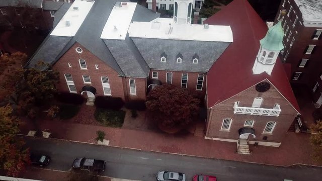Aerial Pullout from Home Moravian Church in Old Salem in Winston Salem in Fall in 4k