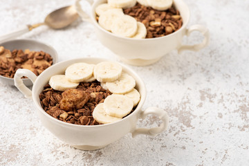 Granola, oatmeal with banana food background