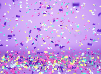 Colorful confetti falling on purple background