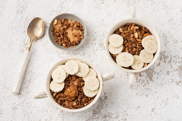Granola, oatmeal with banana food background