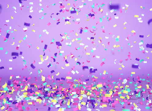 Colorful confetti falling on purple background