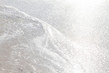 Fototapeta na wymiar Broken wave on beach