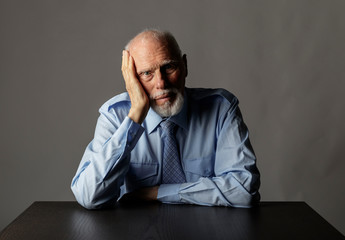 Old man in thoughts.