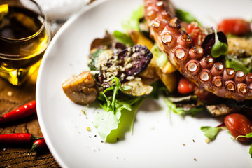Octopus salad served on a plate in restaurant