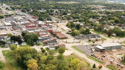  Aerial view of small american city near the Mississippi River. Daytime, cloudy sky. Prairie du Chien, Wisconsin. 