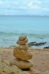 many round stones stacked in balance
