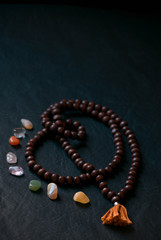 Wooden japamala with colored stones