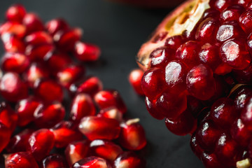 red pomegranate seeds in a bowl