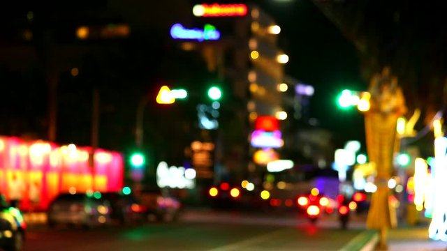 blur pattaya city and traffice light and transport on street and taxi service in night time