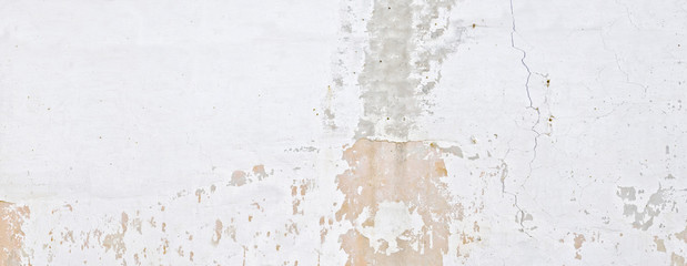 old white wall with crumbling plaster
